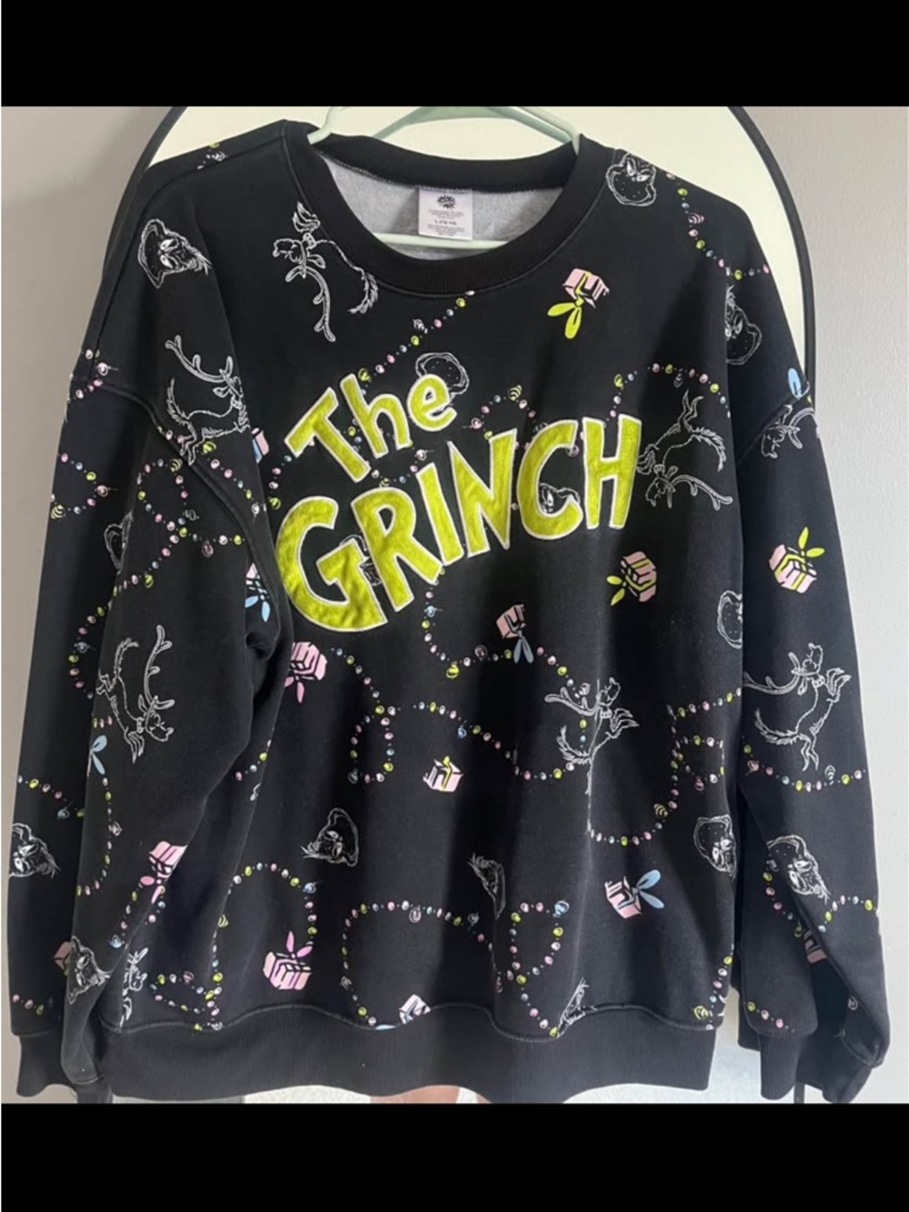 Dr. Seuss Black and White The Grinch Logo Sweatshirt Tag